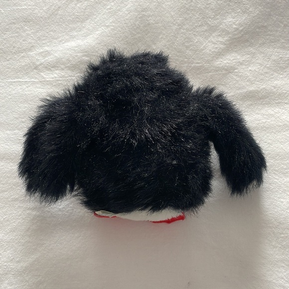 Gund penguin toy wearing earmuffs. Has a squeaker in its left flipper. rare - Picture 4 of 6